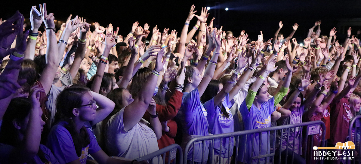 Crowd of concert goers cheering at AbbeyFest