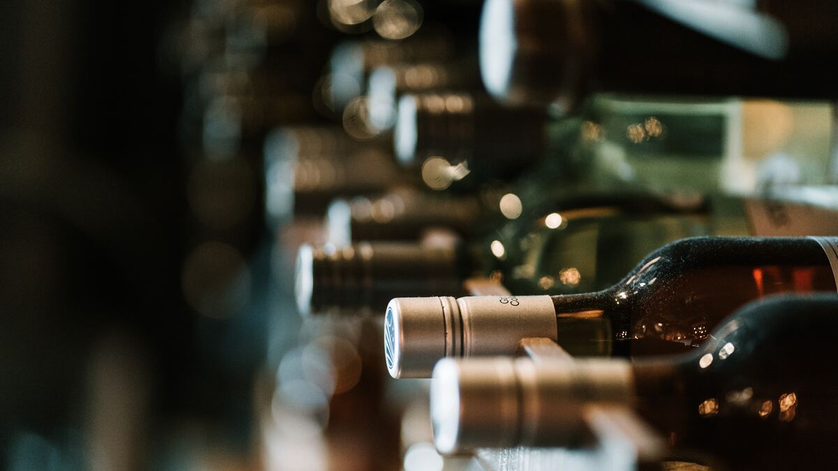 wine bottles on a rack