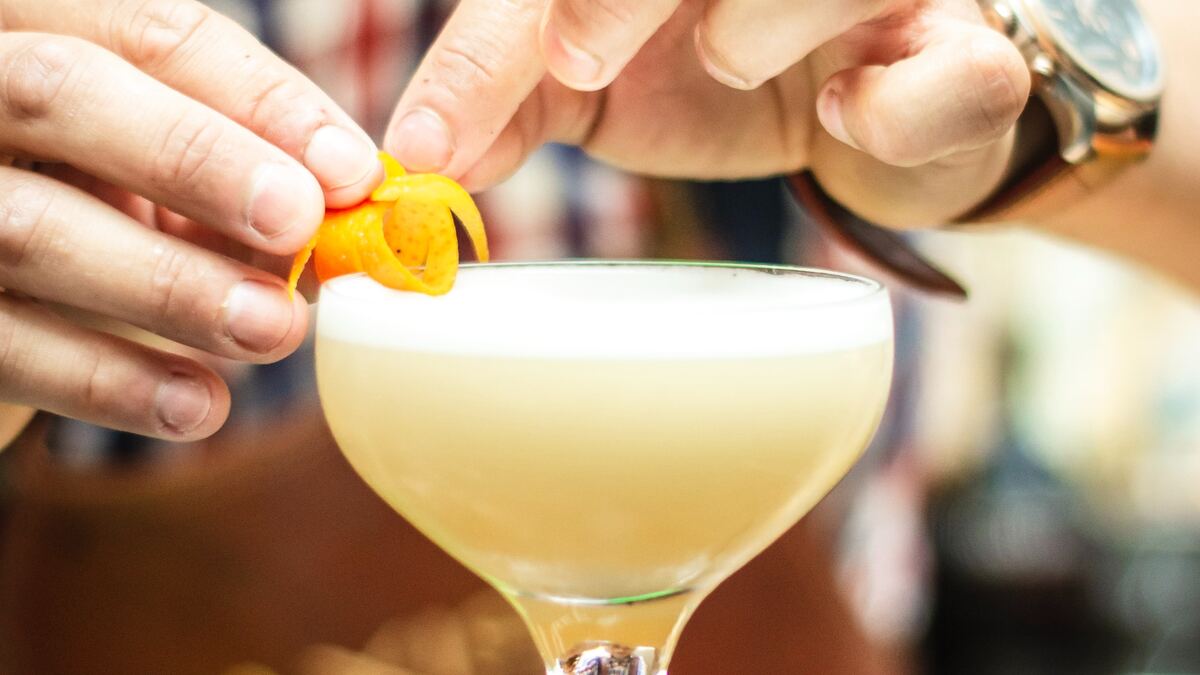 finishing up the garnish on a cocktail