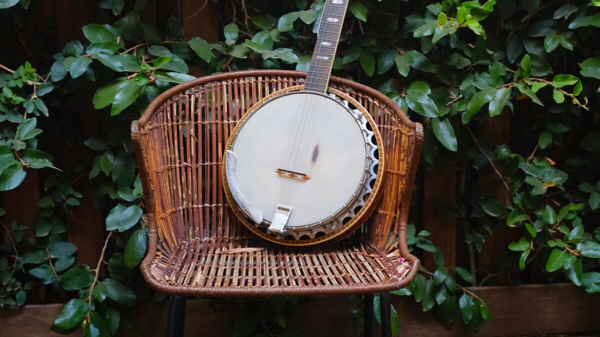 a banjo on a wicker chair