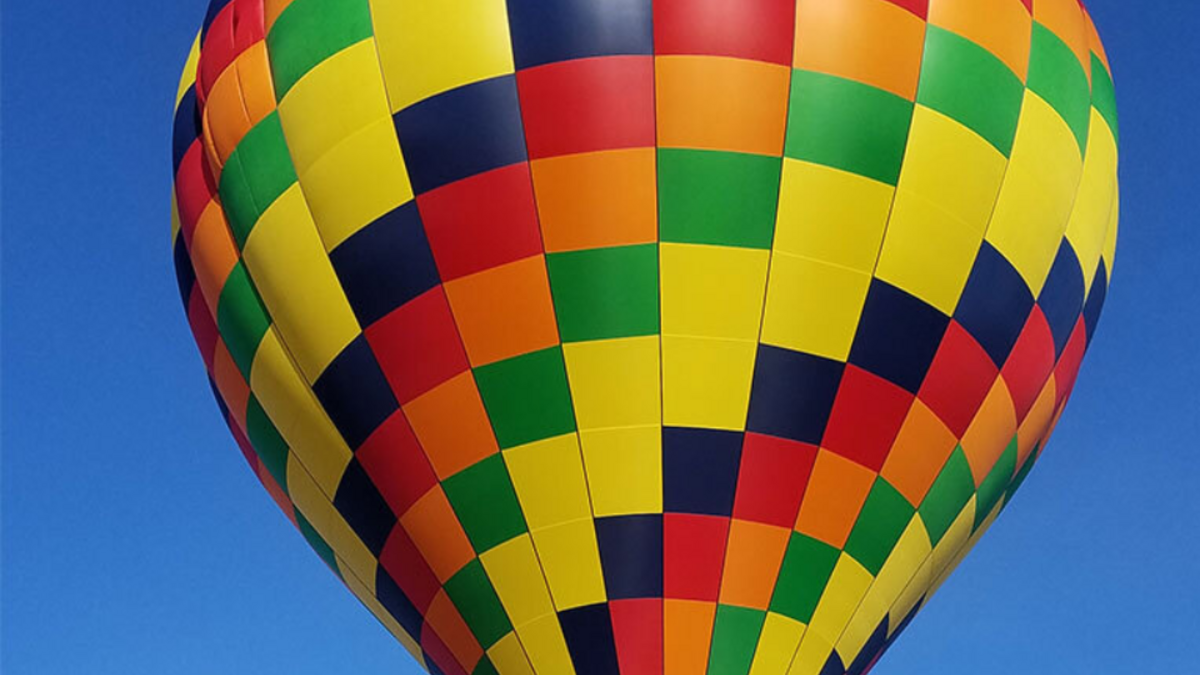 Hot air ballon taking off.